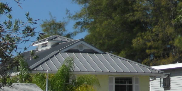 Florida gulf coast home with gray metal roof