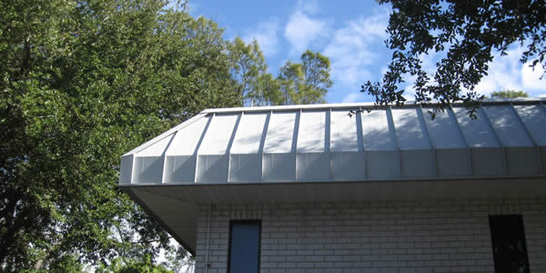 Florida commercial building facade with metal roof line
